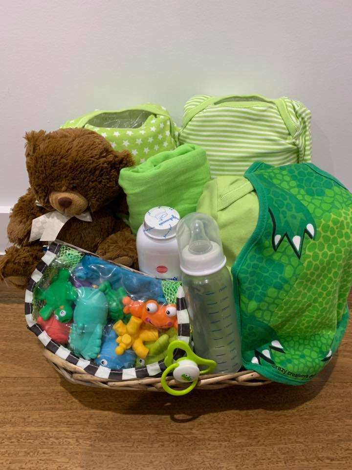 Green unisex baby gift basket