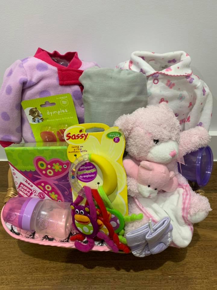 Pink and purple baby girl gift basket