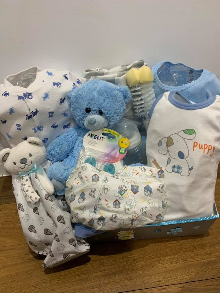 Blue and white baby boy gift basket