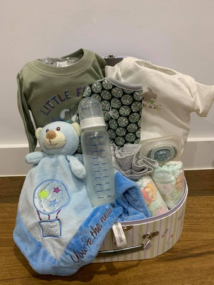 Blue and green baby boy gift basket