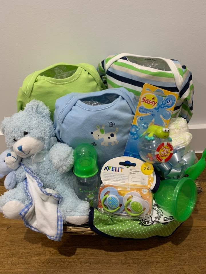 Green and blue baby boy gift basket