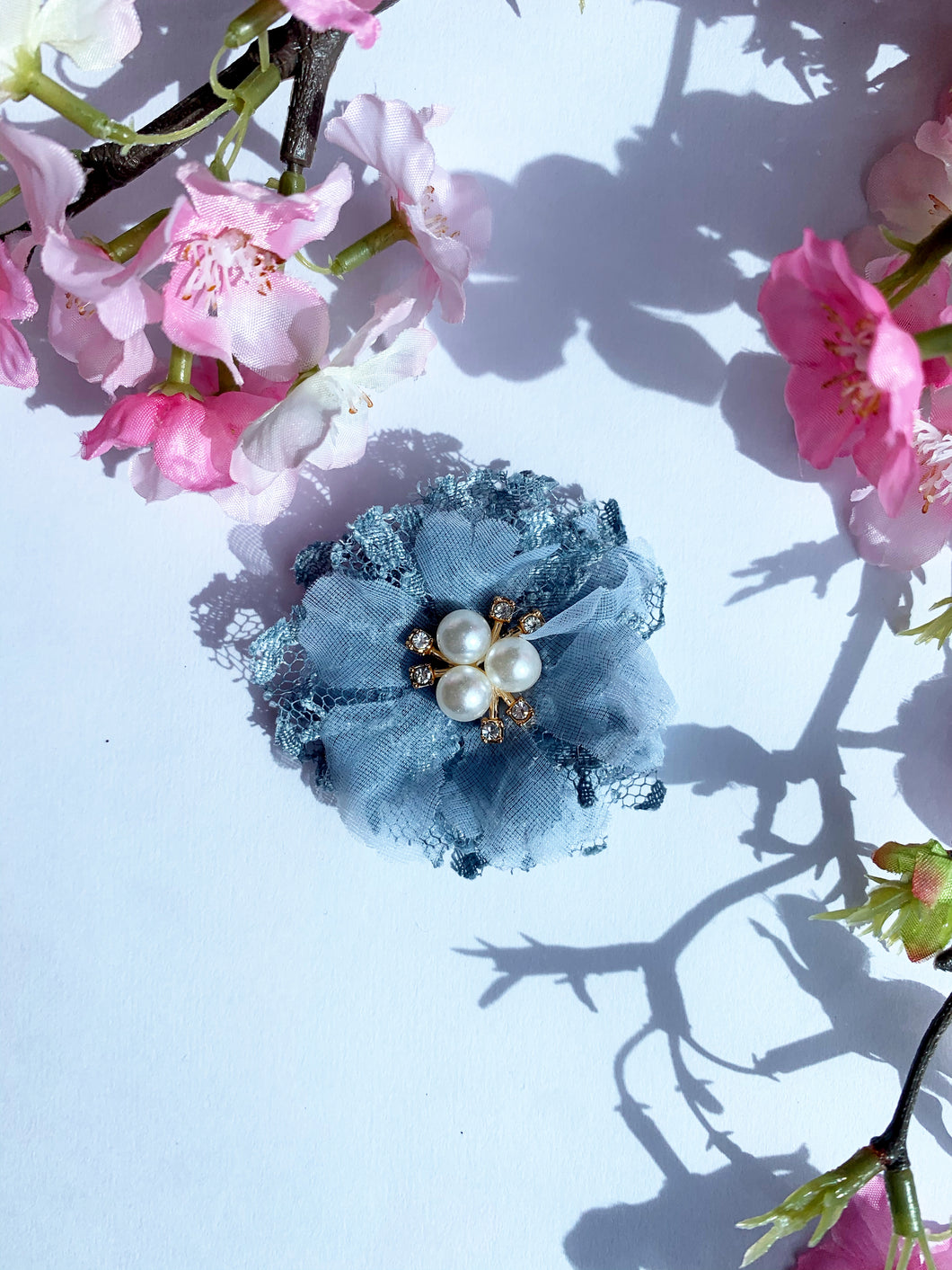 Blue lace flower with diamonds and pearls