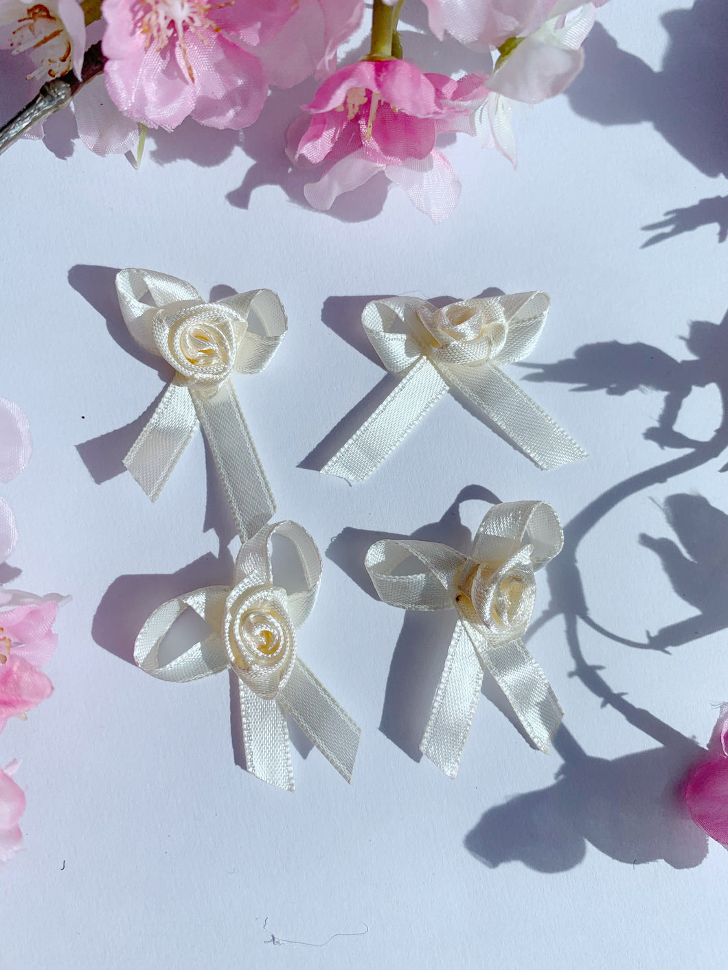 Ivory rose bows 4 pack