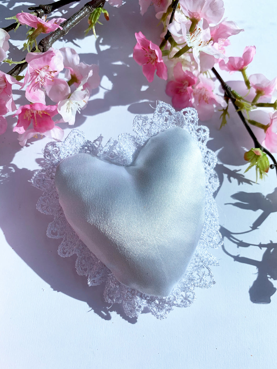 Satin and lace heart cushion