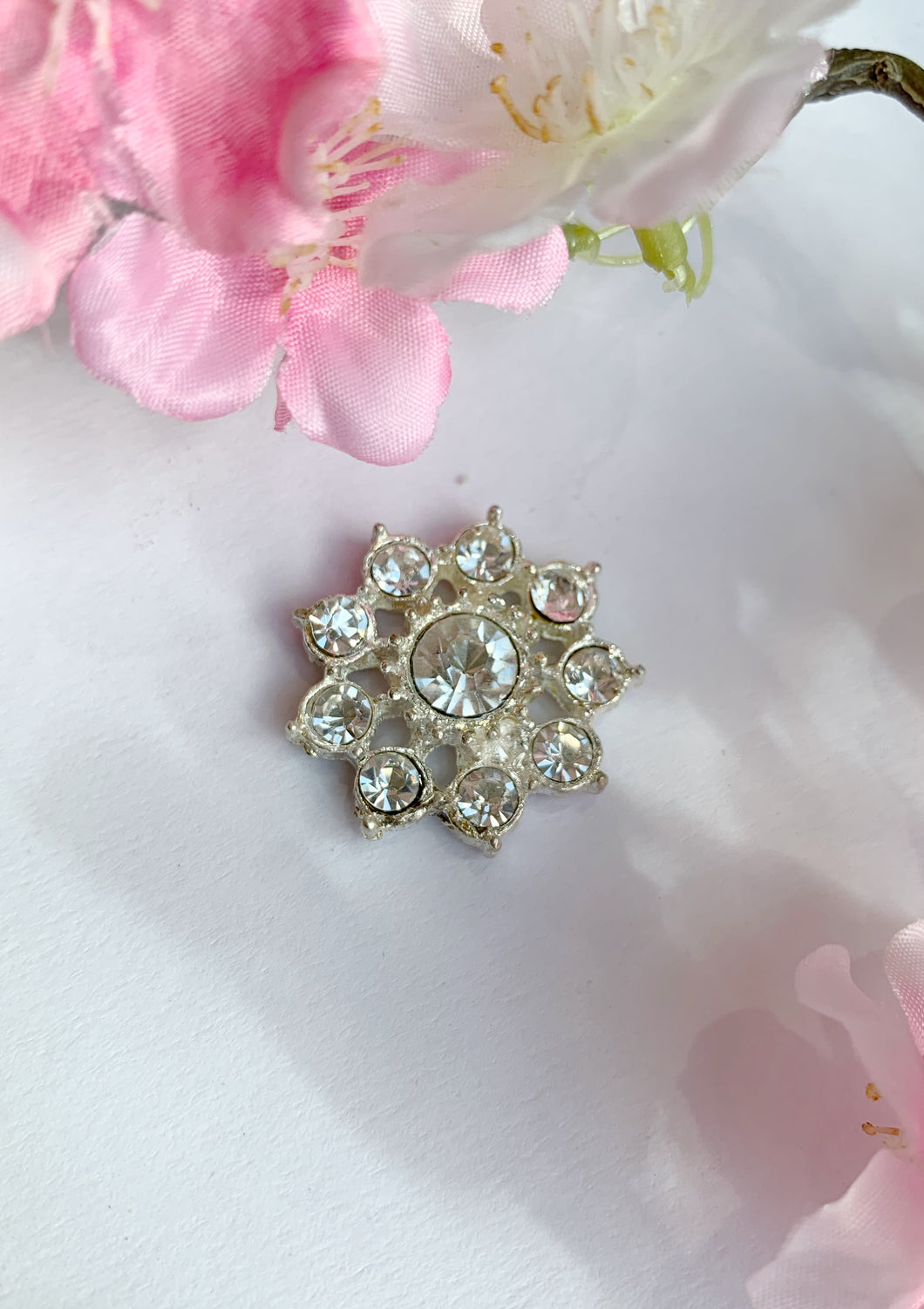 Diamonte metal brooch